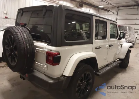 2023 Jeep Wrangler Sahara 4Xe z USA, uszkodzony, nr VIN 1C4JJXP6XPW641653